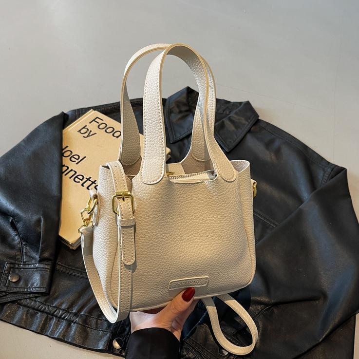 Bolsa de mano ocio transfronteriza versátil para mujeres 2025 nuevo estilo popular retro bolso de cubo de alta calidad simple mochila