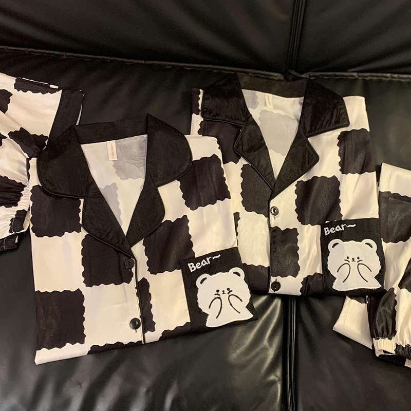 Los pijamas de primavera y otoño usan un hombre y una mujer Pantalones de manga larga de seda de hielo 2024 nuevas rayas más tamaño ropa para el hogar verano