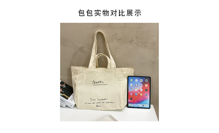 A large-capacity, sturdy Japanese-style canvas bag for women, a new 2022 simple bento handbag for girls to go to work Item Picture