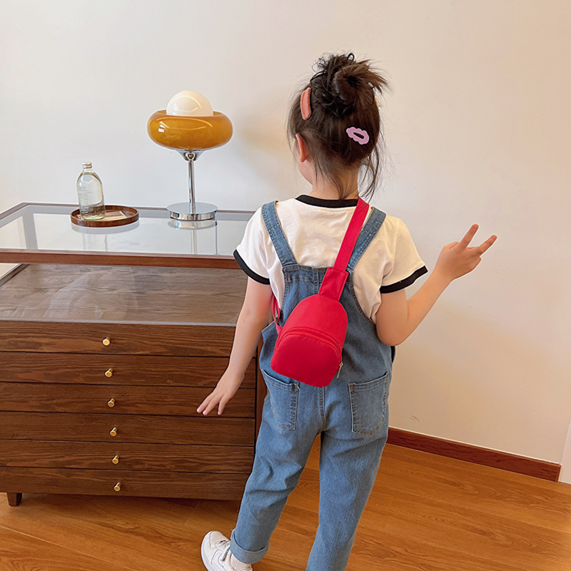 Bolso de pecho coreano para niños y niñas, estilo extranjero, mini bolso de moda de color sólido para niños, 2025 nuevo bolso de comercio exterior para niños