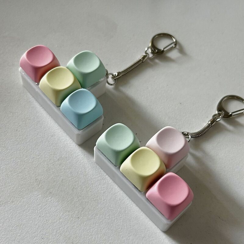 Foreign trade test shaft key decompression toy key chain pendant fingertip press luminous toy fingertip button Foreign trade test shaft key decompression toy key chain pendant fingertip press luminous toy fingertip button