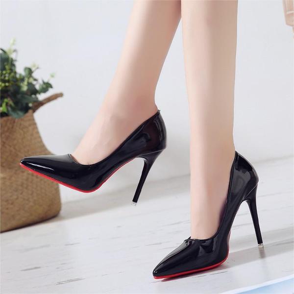 Elegant fashionable high heels nude made of patent leather…