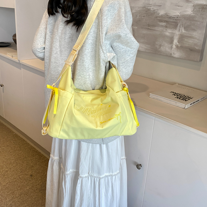 Bolsa de lienzo de letras de la escuela de verano 2024 nueva moda coreana nicho bolso tote de gran capacidad mochila