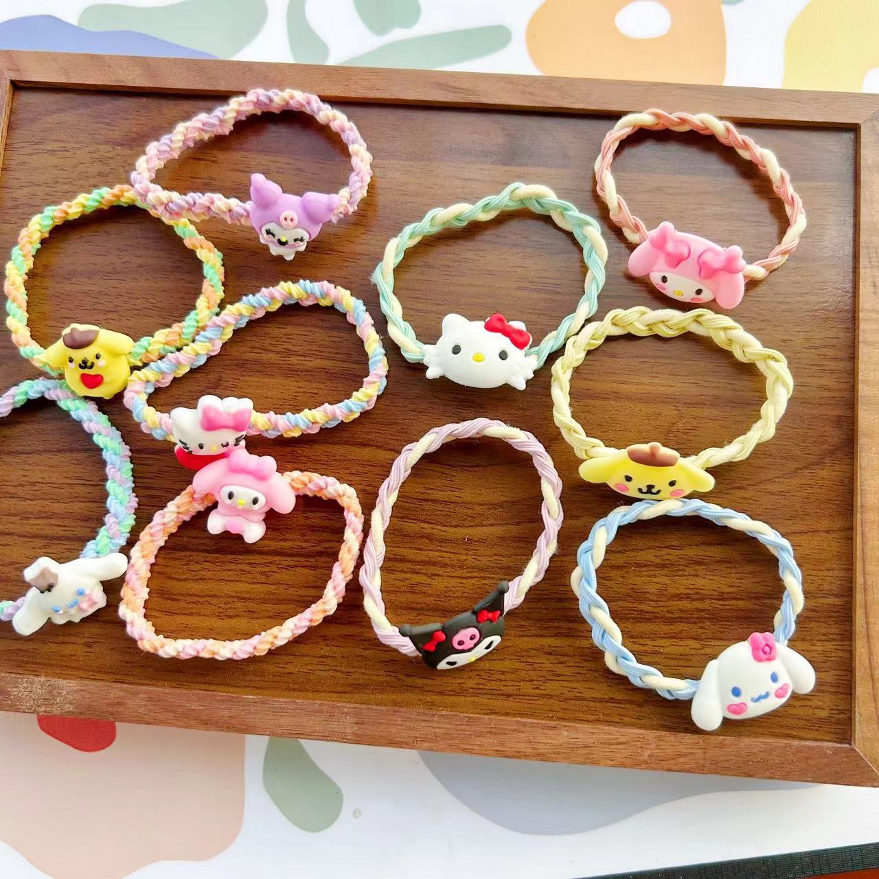 Niños Kuromi elástico Sanliou joyas para el cabello niñas lindas dibujos animados anillo para el cabello niñas atado cabello cuerda al por mayor