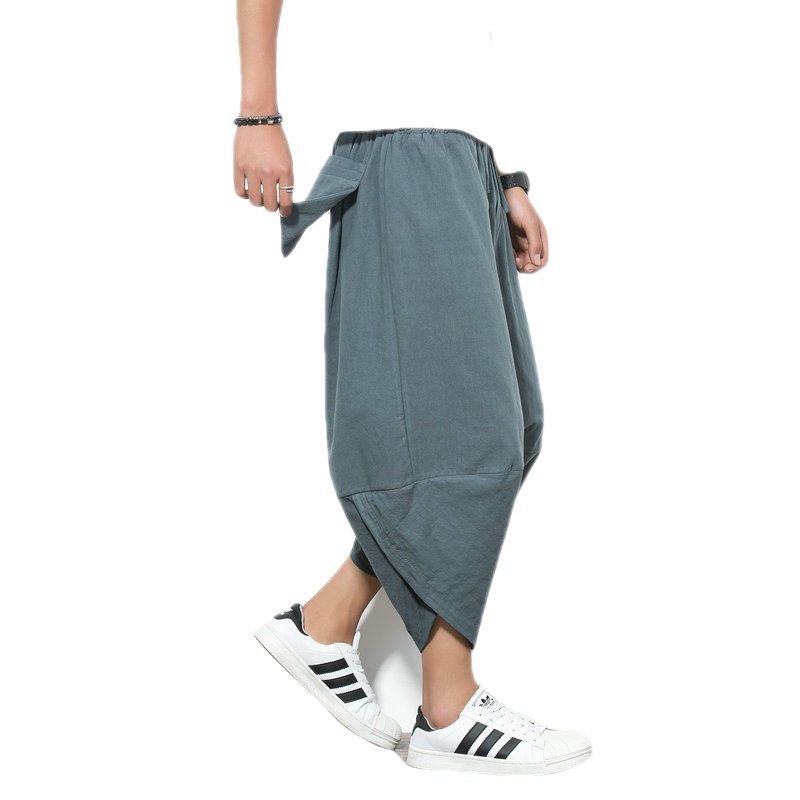 Pantalones de playa de lino Pantalones cortos de pierna ancha de Tailandia de gran tamaño sueltos para hombres Pantalones harem de 7 puntos de algodón y lino de estilo chino casual