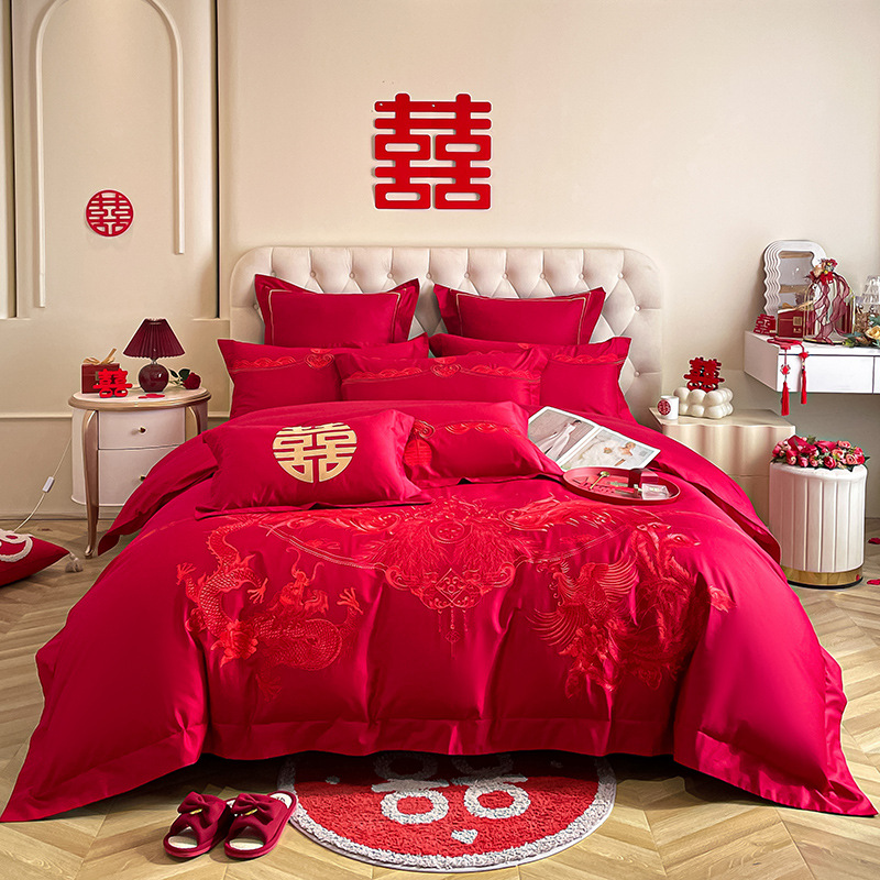 Una clase de madres y bebés de algodón de boda cuatro piezas grandes sábanas bordadas rojas chinas cubierta de cama de boda