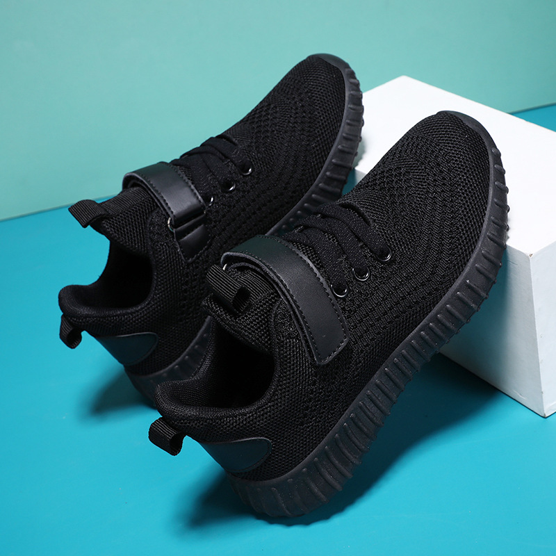 Zapatos para niños malla para niños primavera transpirable 2025 nuevos zapatos deportivos casuales negros de suela blanda para niños pequeños zapatos blancos al por mayor