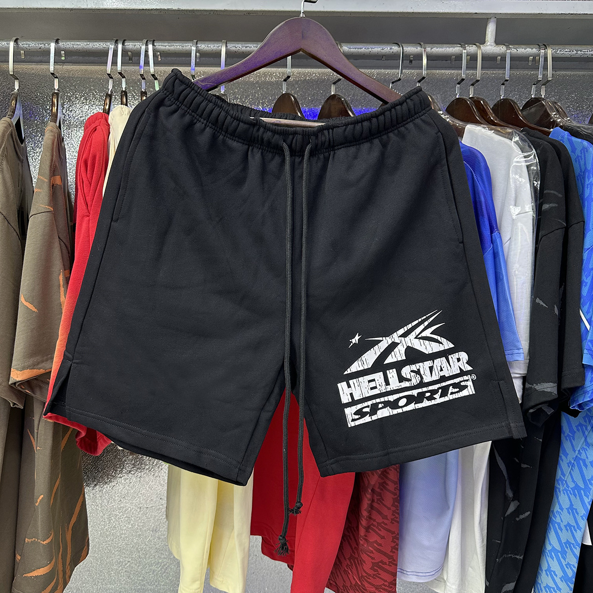 Hell Star lavando y desgastando pantalones cortos casuales 2024 verano nuevo estilo marca de moda europea y americana hip-hop pantalones de cinco puntos hombres y mujeres