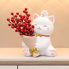 新商品の可愛いアイデア桜の猫が花を持って収納して玄関のリビングルームの寝室に飾るテーブルの装飾品の卸売りをします。