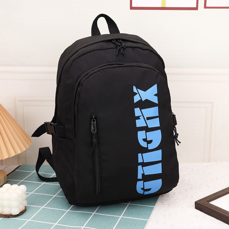 Mochila de moda de moda para hombres 2023 nueva mochila de hombro femenina de gran capacidad de letras de escuela secundaria mochila escolar