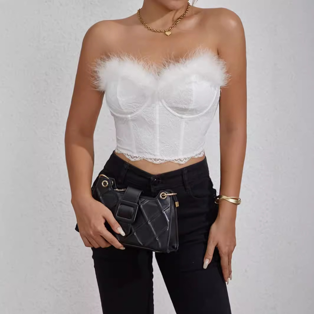 Verano INS Amazon Hot Girl Style Pluma Color sólido Anillo de acero Hueso de pescado con cordón umbilical y espalda abierta Techo de tubo delgado de todo fósforo W041