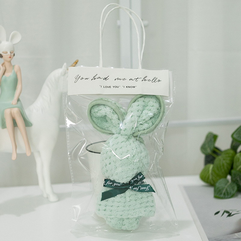 매달린 녹색 토끼 + 핸드백