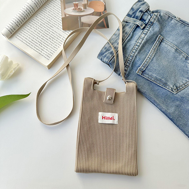 Primavera nuevo color sólido de punto de hombro mochila bolso móvil de moda versátil bolso de dopamina para hombres y mujeres