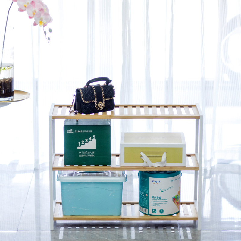 Estante de zapatos simple puerta doméstica interior 2024 explosión nuevo bambú almacenamiento pequeño estrecho en el gabinete de zapatos de madera multicapa