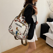 傲隆女包旅行背包双肩一包多用新款蝴蝶花轻便休闲女生出游小背包