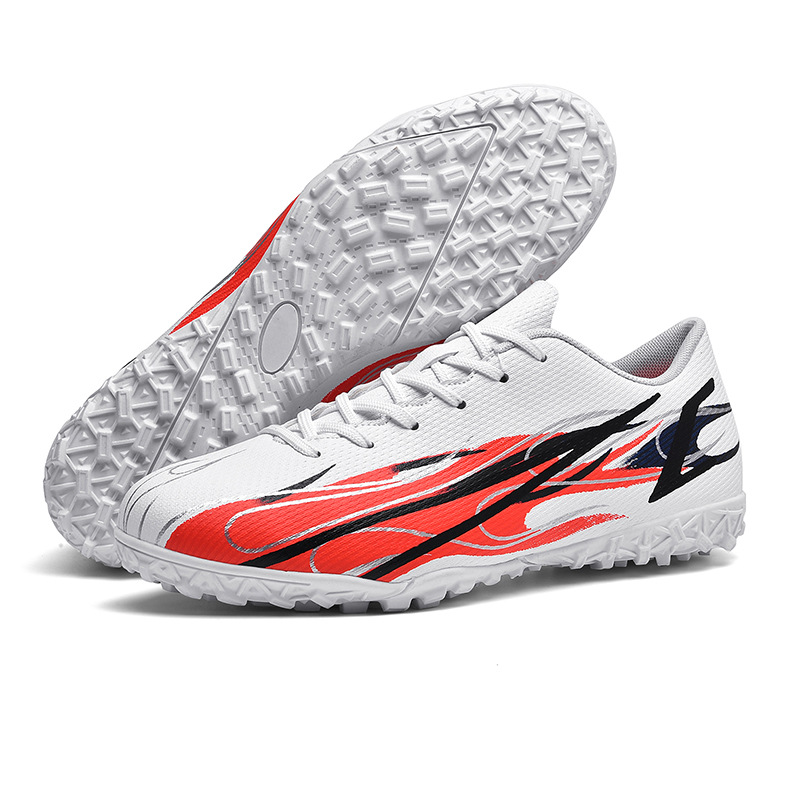 Zapatos de fútbol transfronterizos para niños juveniles juegos de entrenamiento físico entrenamiento de niños pequeños zapatos deportivos al por mayor