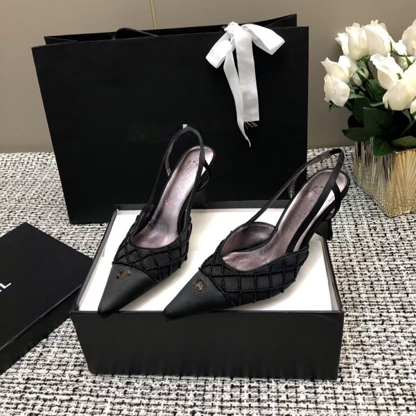 Elegant fashionable high heels with diamond pattern pointed-toe made…