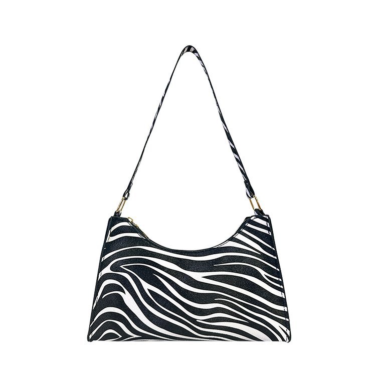 2024 nuevo bolso de axila con estampado de leopardo de moda popular de todos los partidos Bolso de hombro portátil para mujer casual retro europeo y americano