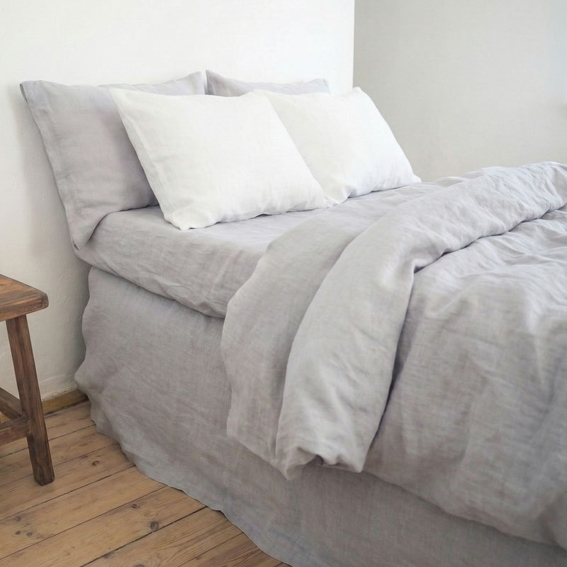 Juego de cuatro piezas de lino puro lavado a la francesa, estilo INS de lujo ligero, ropa de cama de color liso para otoño e invierno, ideal para dormir sin ropa, venta al por mayor para otoño e invierno.