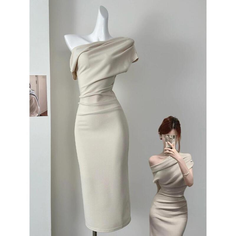 French-Style Asymmetrical Shoulder Dress, Long and Elegant, with a Cinched Waist, Off-Shoulder Design, Ruched, Bodycon, and Slit, Exuding a High-End Socialite Vibe
