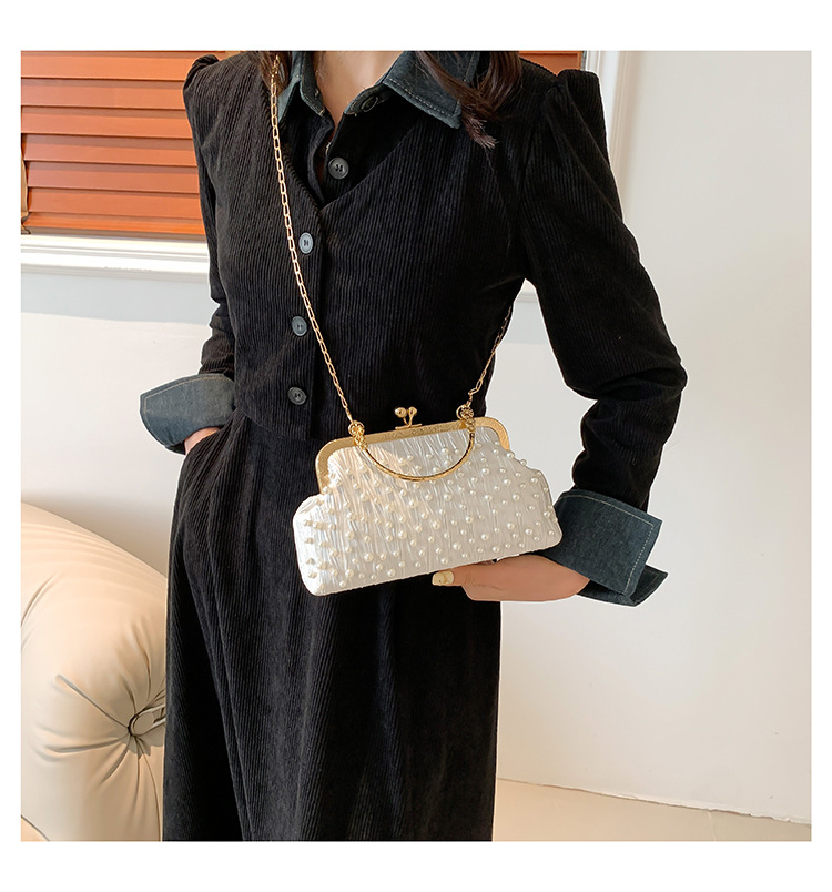 Bolso de las mujeres bolso de la cadena de la perla 2024 principios de primavera nueva moda bolso de hombro fresco dulce hermoso bolso crossbody de aspecto alto para las mujeres