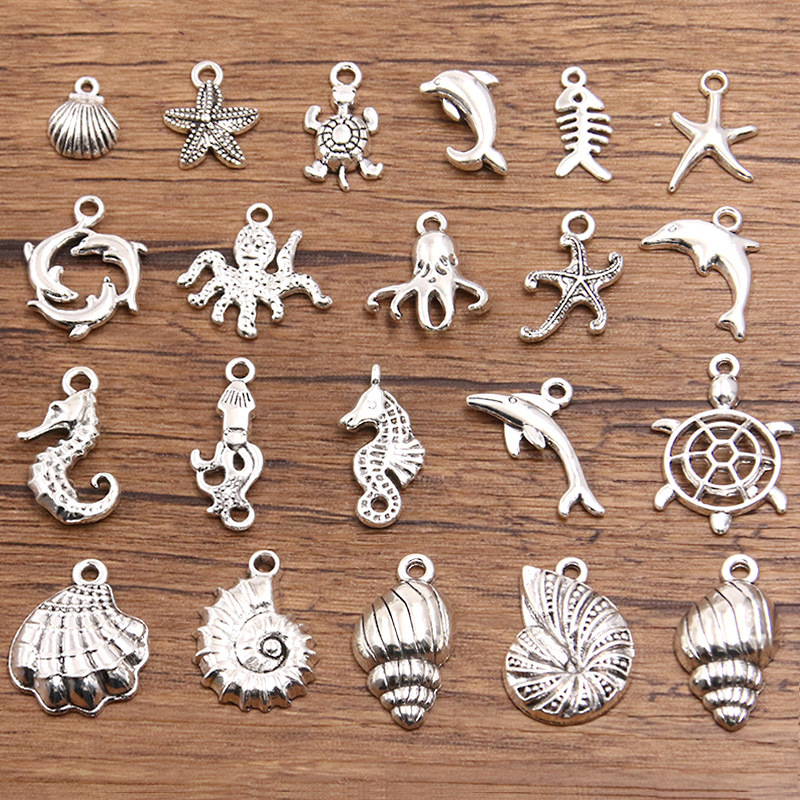 A Variety of DIY Alloy Jewelry Accessories, Marine Life Charm, Conch, Dolphin, Octopus, Seahorse, Turtle Pendant A Variety of DIY Alloy Jewelry Accessories, Marine Life Charm, Conch, Dolphin, Octopus, Seahorse, Turtle Pendant