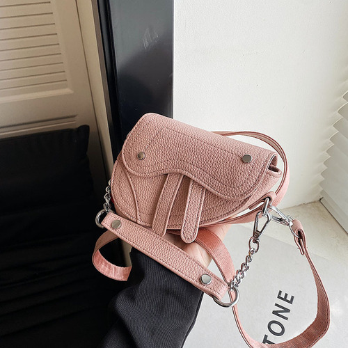 New fashionable saddle children's bag for boys and girls, motorcycle style rivet hand-held crossbody bag, trendy concave shape small bag