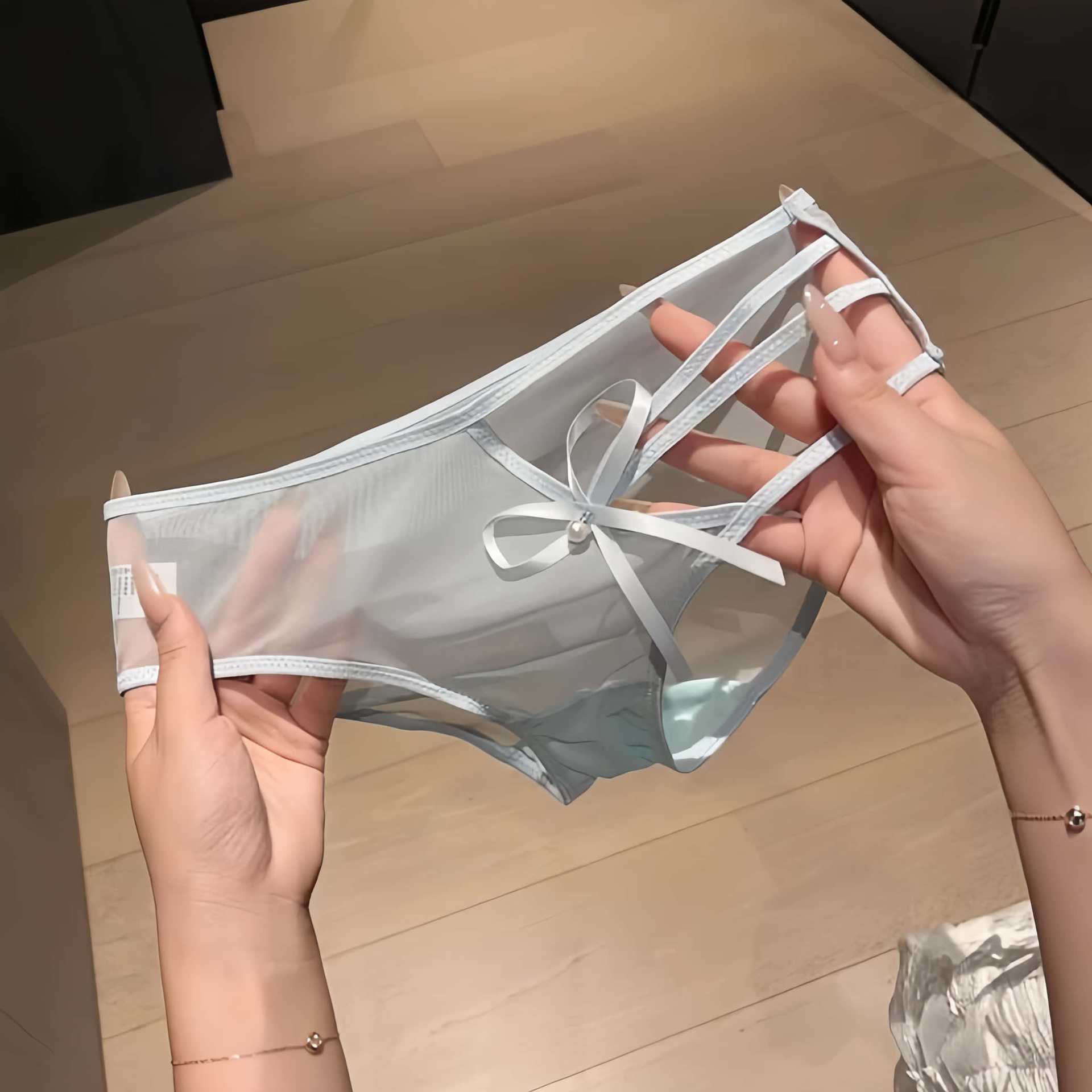 French-style pure desire mesh bow-tie low-rise triangle panties, sexy hollow-out transparent seamless women's underwear