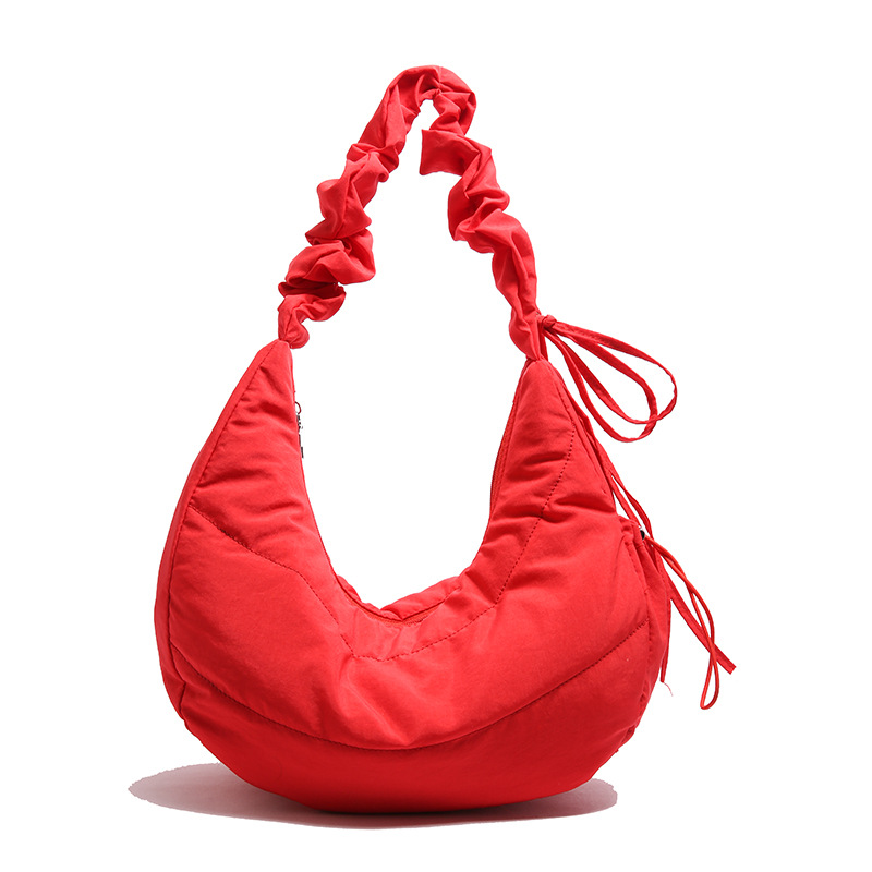 Bolso debajo de la axila para mujeres 2025 primavera nuevo diseño bolso plegado simple nicho bolso de hombro de mujeres