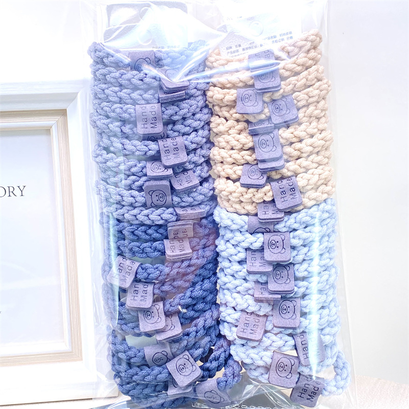 Traje de tarjeta cara sonriente oso etiqueta de cuero leche té color Banda para el cabello corbata de pelo de las mujeres banda de goma supermercado 2 yuanes tienda física accesorios para el cabello