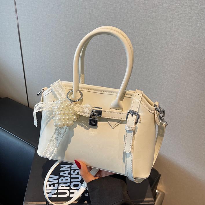 Bolso de concha de moda de verano transfronterizo para mujer 2025 nuevo bolso de hombro de estilo occidental de todo fósforo bolso de mensajero de moda de alta gama