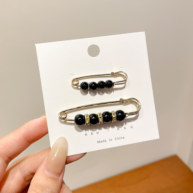 Falda con hebilla de cintura de perlas, circunferencia de cintura grande, cambio de artefacto, hebilla anti-luz, ropa, broche de diseño fijo