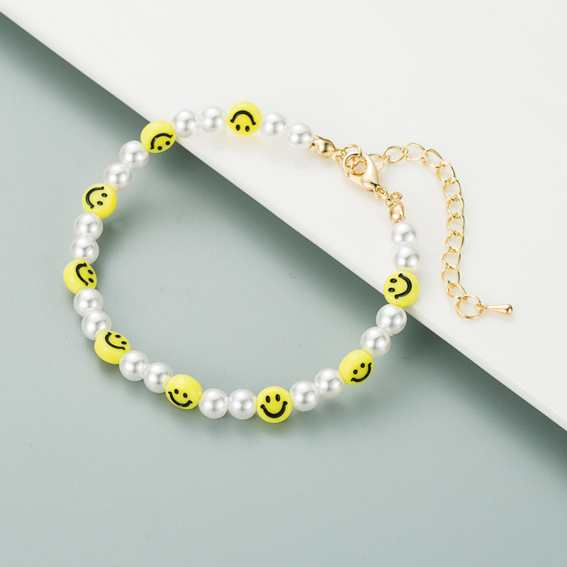 Korean New Pearl Acrylic Heart-shaped Smiling Face Bracelet display picture 5