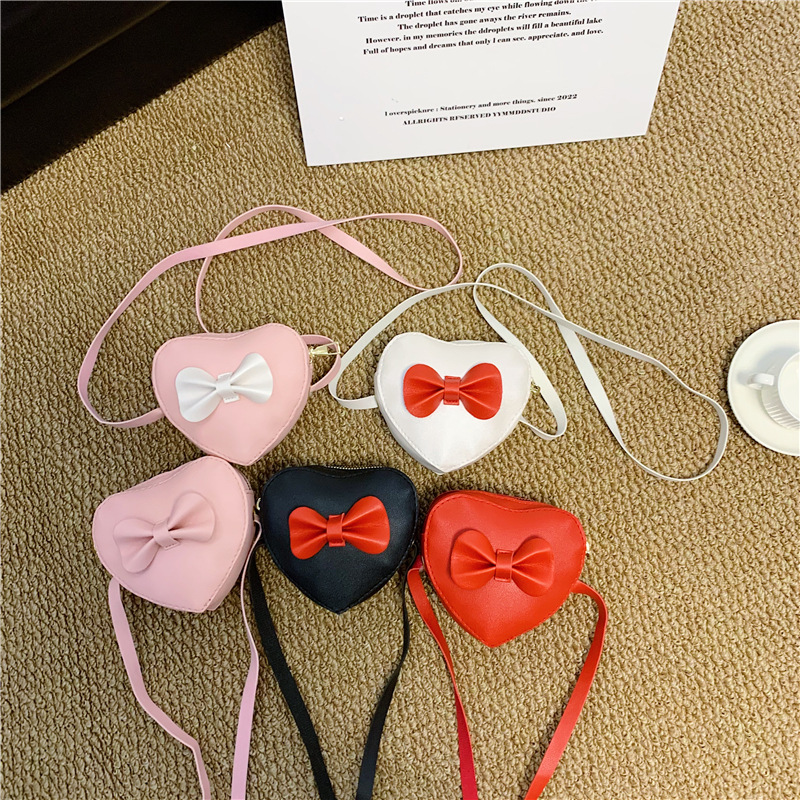 Dulce amor modelado niña pequeña bolso de hombro de dibujos animados arco bebé mochila 2026 nuevo bolso para niños