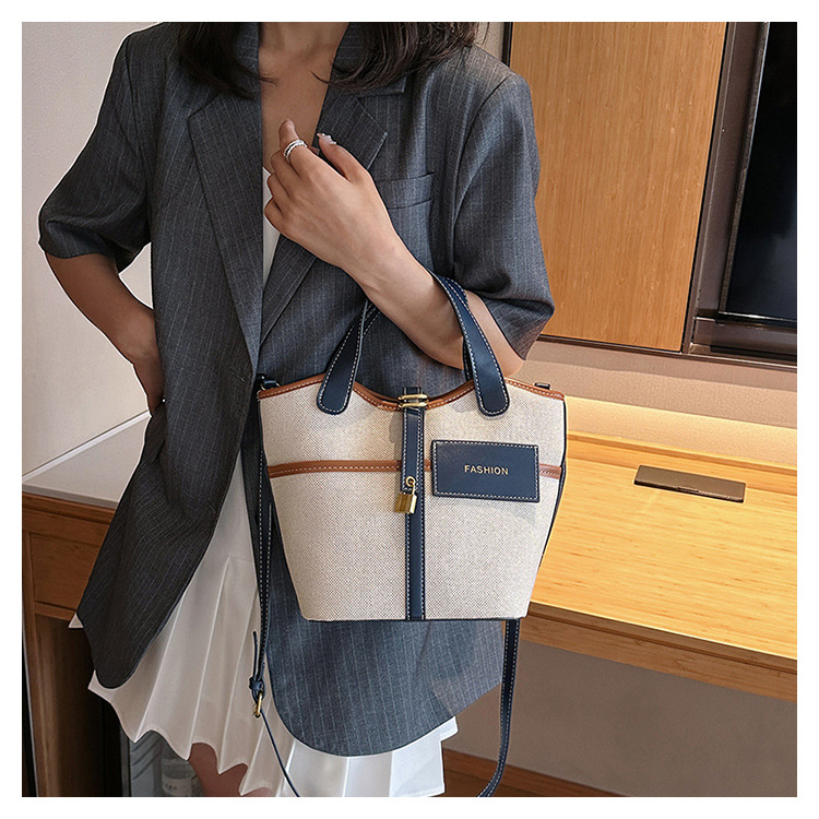 Nicho de diseño retrógrado lienzo portátil bolso de cubo de agua mujer 2026 nuevo cross-border ins canasta de moda bolso de mochila image 7