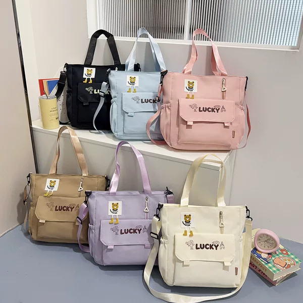 Large-capacity lightweight casual shoulder bag for primary and secondary school students, suitable for commuting to class, unisex tutoring bag, stylish crossbody bag