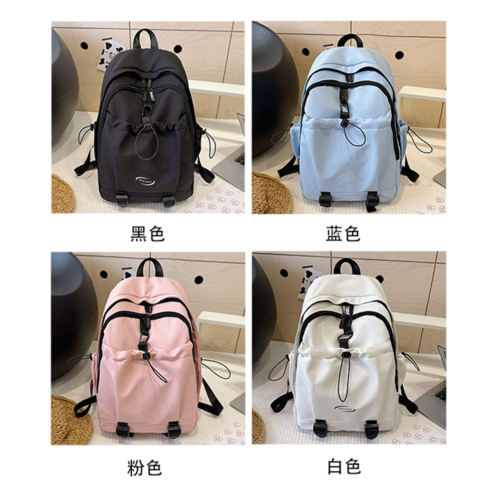 Nuevo estilo coreano transfronterizo de color sólido simple y versátil para estudiantes de escuela primaria y secundaria de alta capacidad mochila de viaje