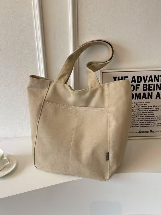 Versión coreana original casera de gran capacidad ins bolso de tela de vela simple y perezoso para estudiantes en clase bolso de viaje de todo fósforo