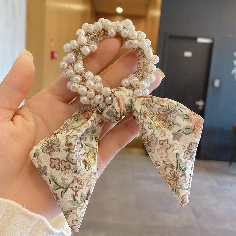 Corea del Sur floreciente correa de arco tocado de perlas rojas anillo de pelo correa de cabello de verano correa de cabello