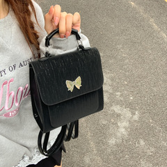 潮流小众设计蝴蝶结背包女高中大学生韩版时尚简包包女质感双肩包