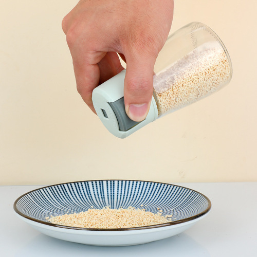 Kitchen condiment jar set sealed moisture-proof sprinkling bottle automatic opening and closing oil pot spoon lid integrated condiment bottle wholesale