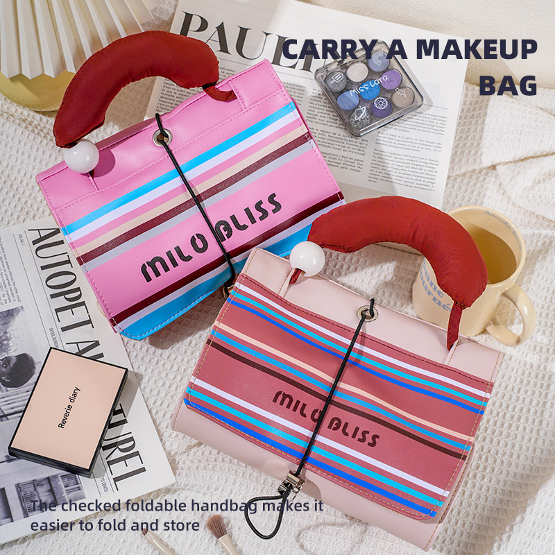 Xiaohongshu bolsa de cosméticos explosiva bolsa de lavado impermeable portátil de color de contraste lindo de gran capacidad bolsa de almacenamiento para productos para el cuidado de la piel femenina