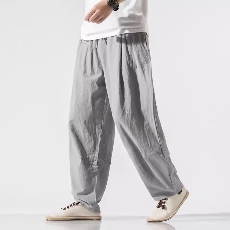 Pantalones de lino de traje Tang de estilo chino para hombres Pantalones de harén de pierna ancha de gran tamaño sueltos casuales para hombres Pantalones de linterna para jóvenes