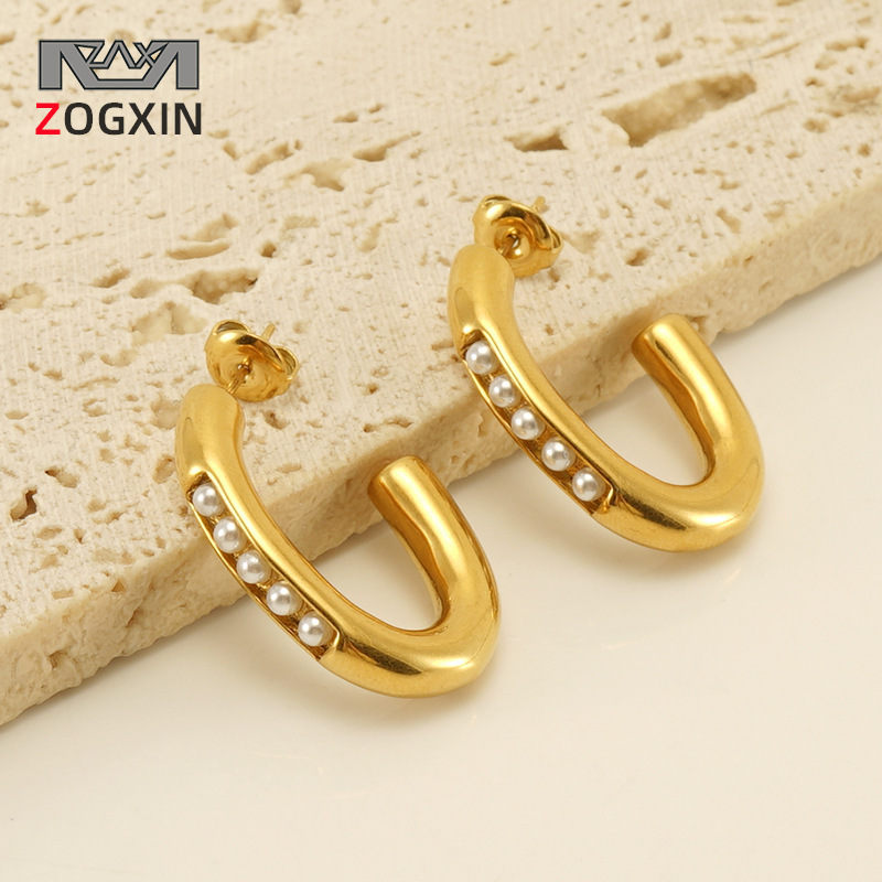 INS estilo francés estilo de alta calidad de acero inoxidable pendientes femeninos europeos y americanos 18K pendientes de perlas con incrustaciones de acero de titanio pendientes al por mayor