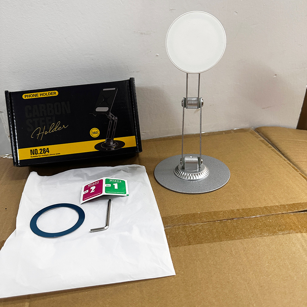 Soporte giratorio de 360 grados para computadora portátil, soporte metálico plegable y ajustable para computadora con función de elevación y refrigeración, venta al por mayor del fabricante