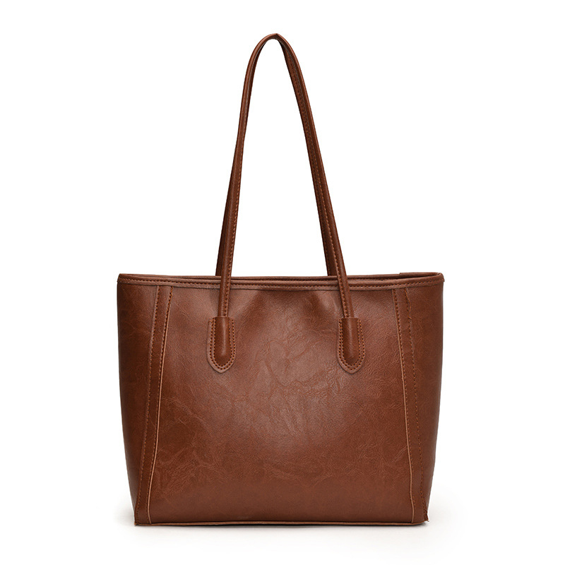 Bagos de textura de transporte aéreo 2024 otoño y invierno nuevo estilo coreano de moda bolso de hombro axilar temperamento bolso especial