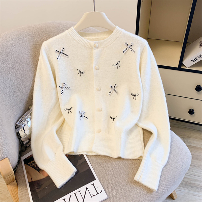 Women's round-neck knitted cardigan with three-dimensional bow decoration, short style, soft and gentle, loose fit, slimming, suitable for layering Women's round-neck knitted cardigan with three-dimensional bow decoration, short style, soft and gentle, loose fit, slimming, suitable for layering