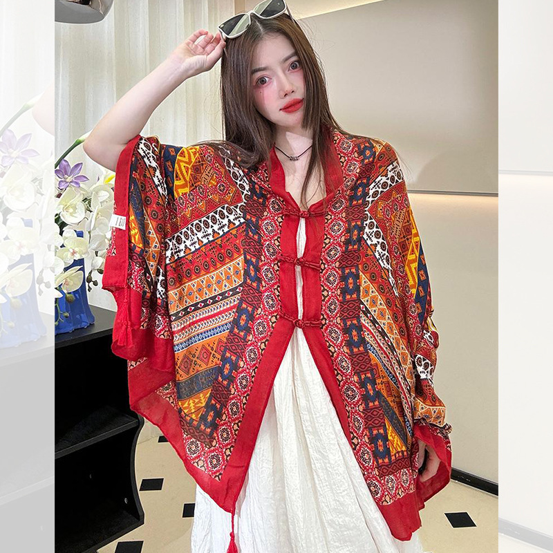 Chal de protección solar de verano para mujer 2025 nuevo estilo hebilla largo estilo étnico fotografía de viaje estilo fino playa bufanda de seda capa