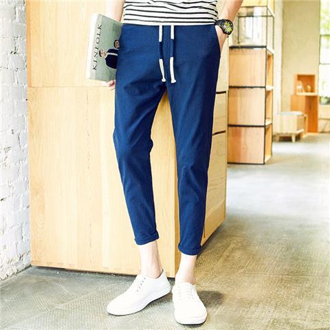 Pantalones cortos casuales pantalones de verano de 9 puntos para hombres, pies pequeños, pantalones de lino rectos coreanos sueltos, pantalones harem para estudiantes de secundaria para hombres