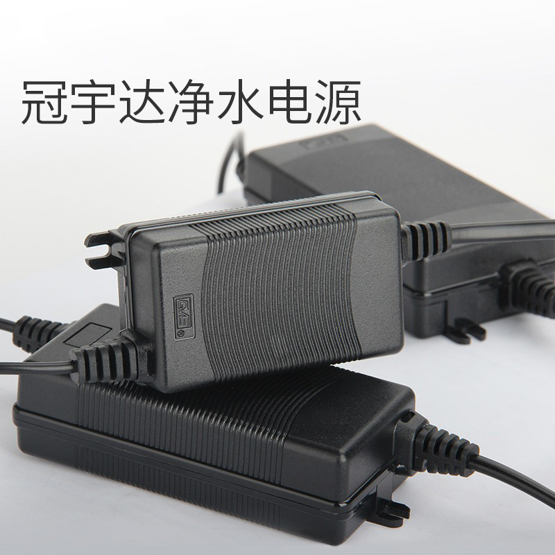 Purificador de agua adaptador de alimentación Guanyu Da cabeza redonda DC estabilizador de agua adaptador de transformador accesorios al por mayor